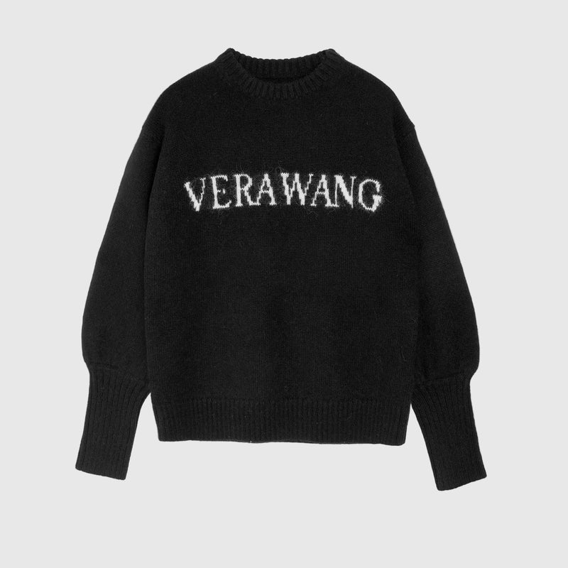 A black knit crewneck sweater with 'VERAWANG' written across the chest in white textured lettering, displayed on a clean white background.