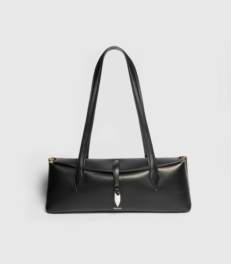 A black leather shoulder bag with a structured rectangular shape, long shoulder straps, and a central strap detail with a silver-toned teardrop-shaped charm, shown against a light gray background.
