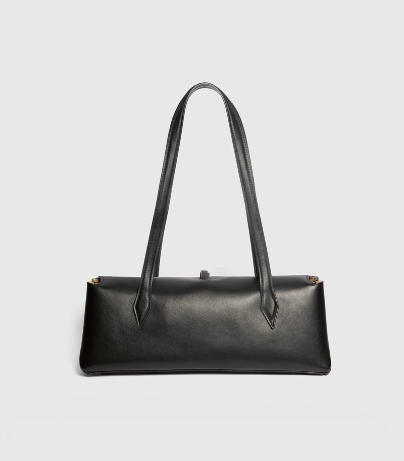 A black leather shoulder bag with a structured rectangular silhouette, and dual shoulder straps, shown against a light gray background.