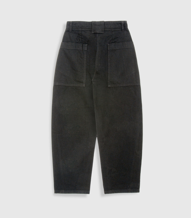 Flat lay product back view of high-rise, ankle length, balloon fit jeans in washed black denim, showcasing large patch back pockets, belt loops, and a wide central belt loop against a white background.