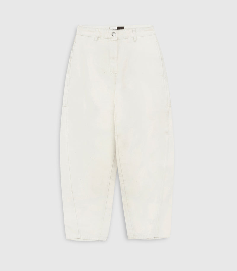 Flat lay product view of high-waisted, wide-leg balloon jeans in ecru denim, featuring structured side seams and a silver button closure against a white background.