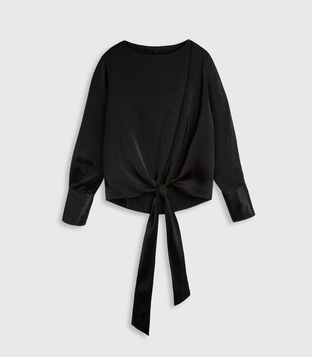 A black long-sleeve blouse with a draped wrap-style neckline and a front tie detail, shown against a light gray background.