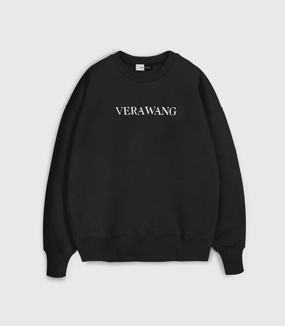 A black crewneck sweatshirt with 'VERA WANG' spell-out logo across the chest, against a white background.