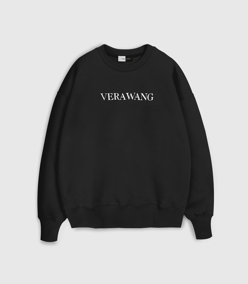 A black crewneck sweatshirt with 'VERA WANG' spell-out logo across the chest, against a white background.