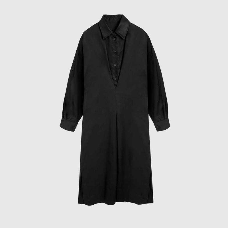 A black long-sleeve shirt dress with a pointed collar and buttoned chest detail, shown against a plain white background.
