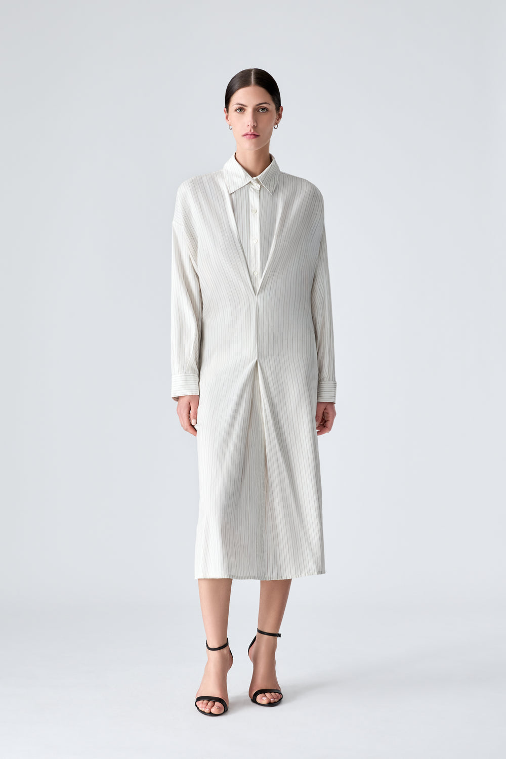 Displays a model wearing the White 'Vera Wang' branded dress