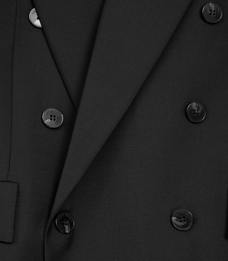 Close-up of a black coat with double-breasted buttons