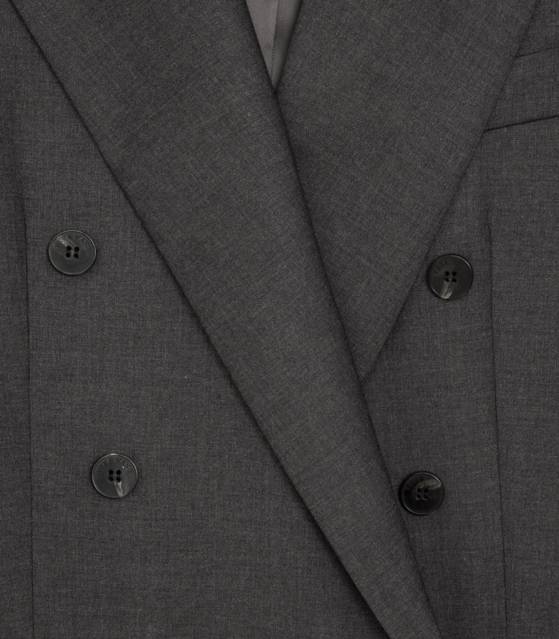 Close-up of a dark gray double-breasted suit jacket, showing the textured fabric, lapels, and dark buttons.