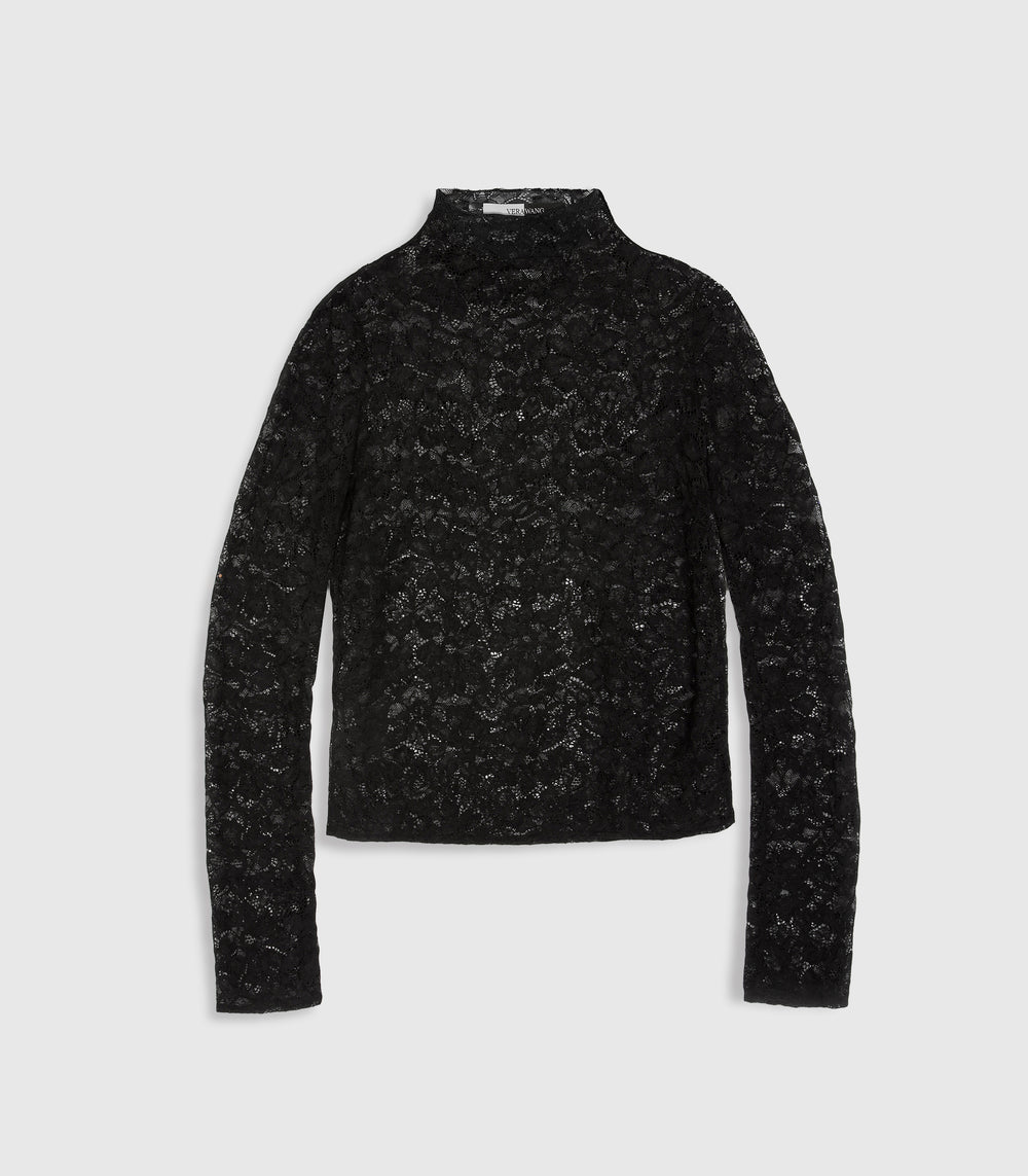 Flat lay product view of a long-sleeved black polo neck top crafted from an all-over, sheer floral lace. The layout highlights the high mock collar neckline, long slim sleeves, and a straight hemline, with a subtle split black-and-white inner neck 'VERA WANG' brand label peeking through the translucent textile against a light grey background.