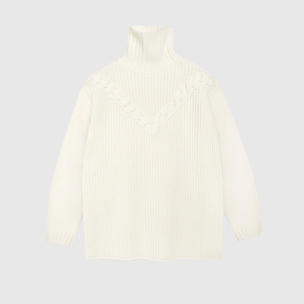 An off-white ribbed knit turtleneck sweater with decorative braided detailing across the upper chest, displayed on a clean white background.