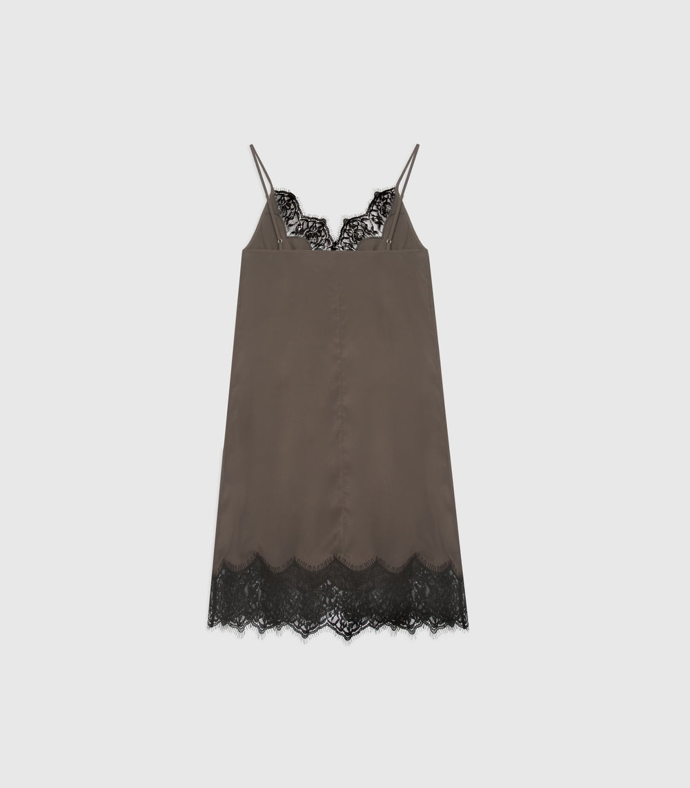 A brown satin slip dress with black lace trim at the neckline and hem, displayed flat against a light gray background.