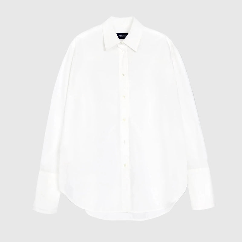 A white long-sleeve button-up shirt with a pointed collar and buttoned cuffs, displayed flat against a solid white background.