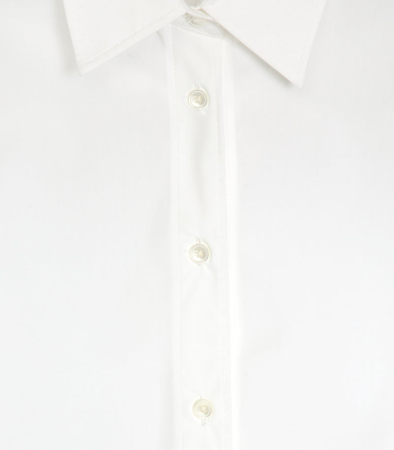 Close-up of a white long-sleeve button-down shirt showing the collar, front placket, and buttons.