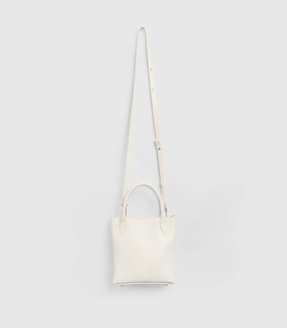 White shoulder bag on a light gray background