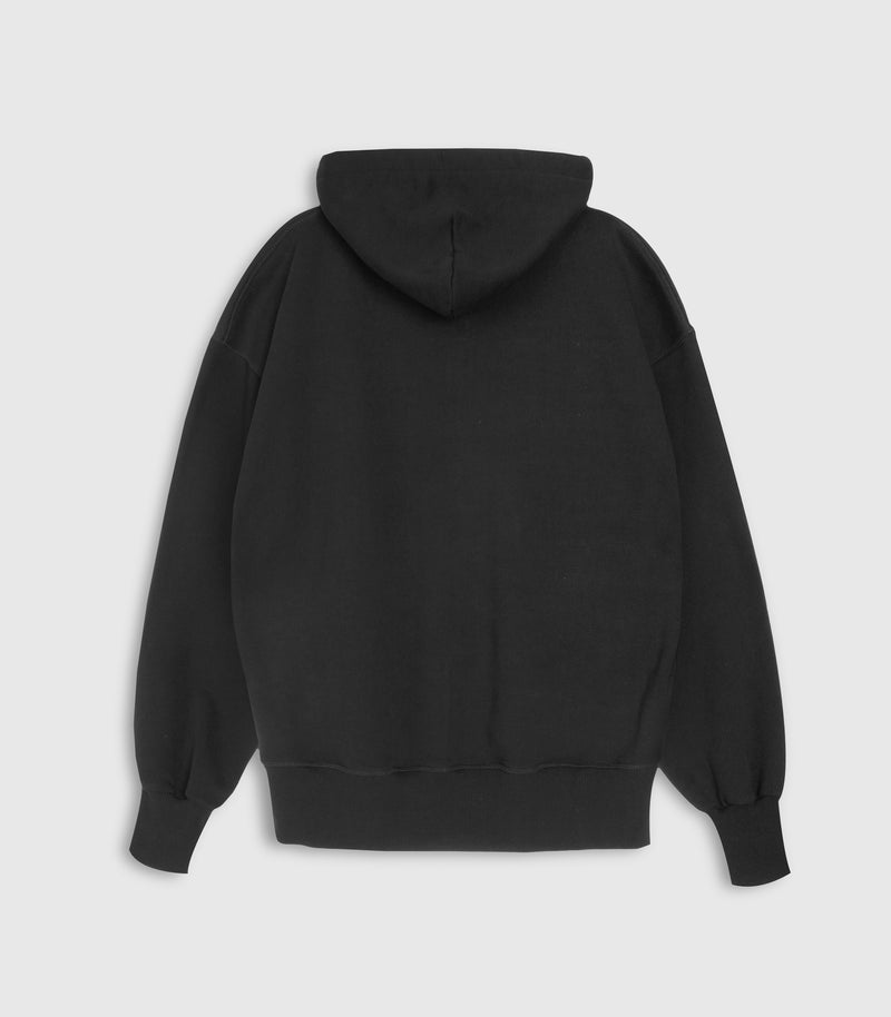 A black oversized hoodie against a white background.
