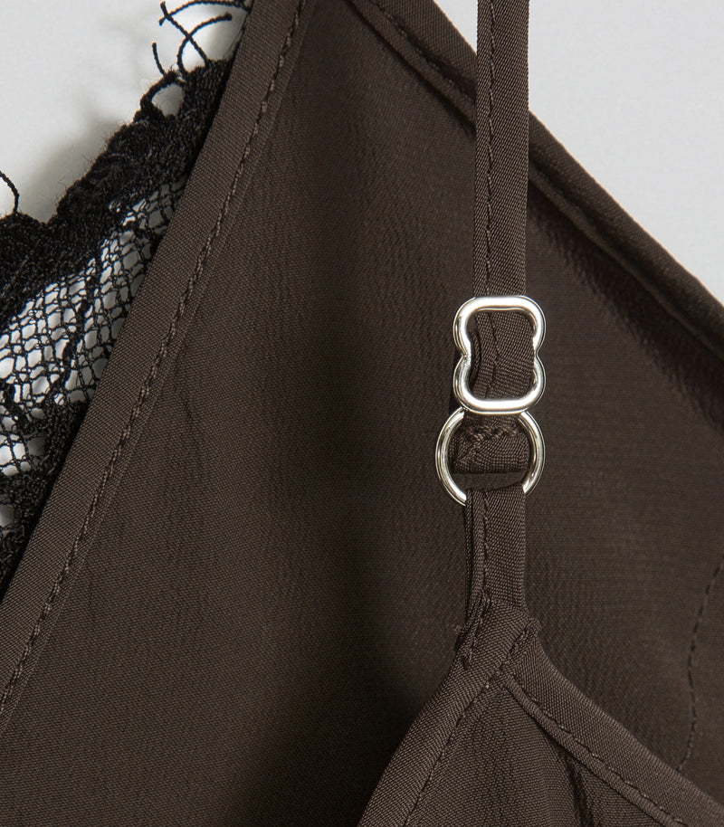 Displays the Sibel Turkish Coffee 'Vera Wang' branded Lace Slip Dress featuring a close up on the details