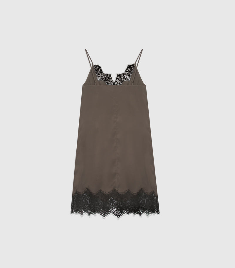 A brown satin slip dress with black lace trim at the neckline and hem, displayed flat against a light gray background.
