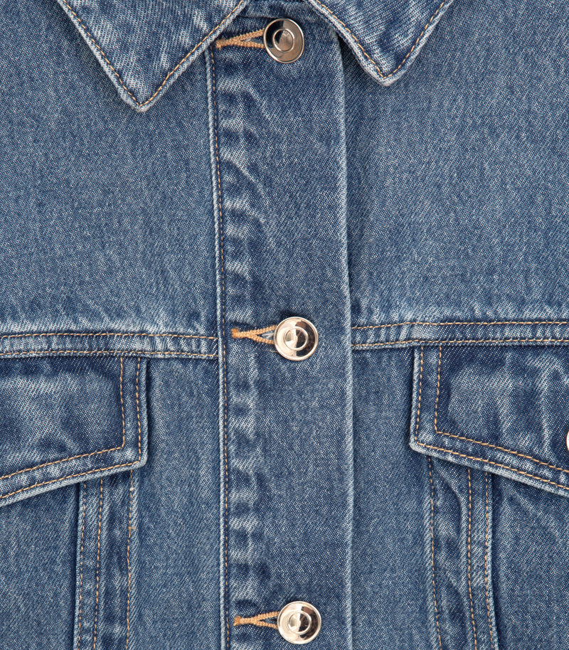 Close-up of a blue denim jacket showing the front button closure with silver metal buttons and contrast stitching.