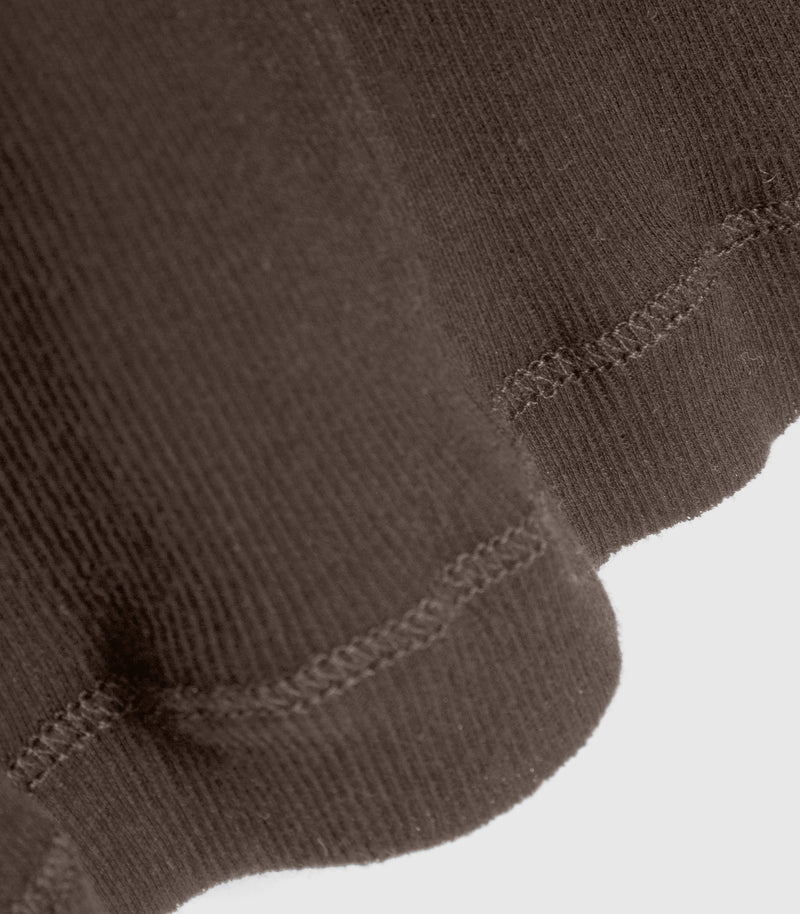 Displays the Sheer Turkish Coffee 'Vera Wang' branded Long Sleeve Top featuring a close up on the details 