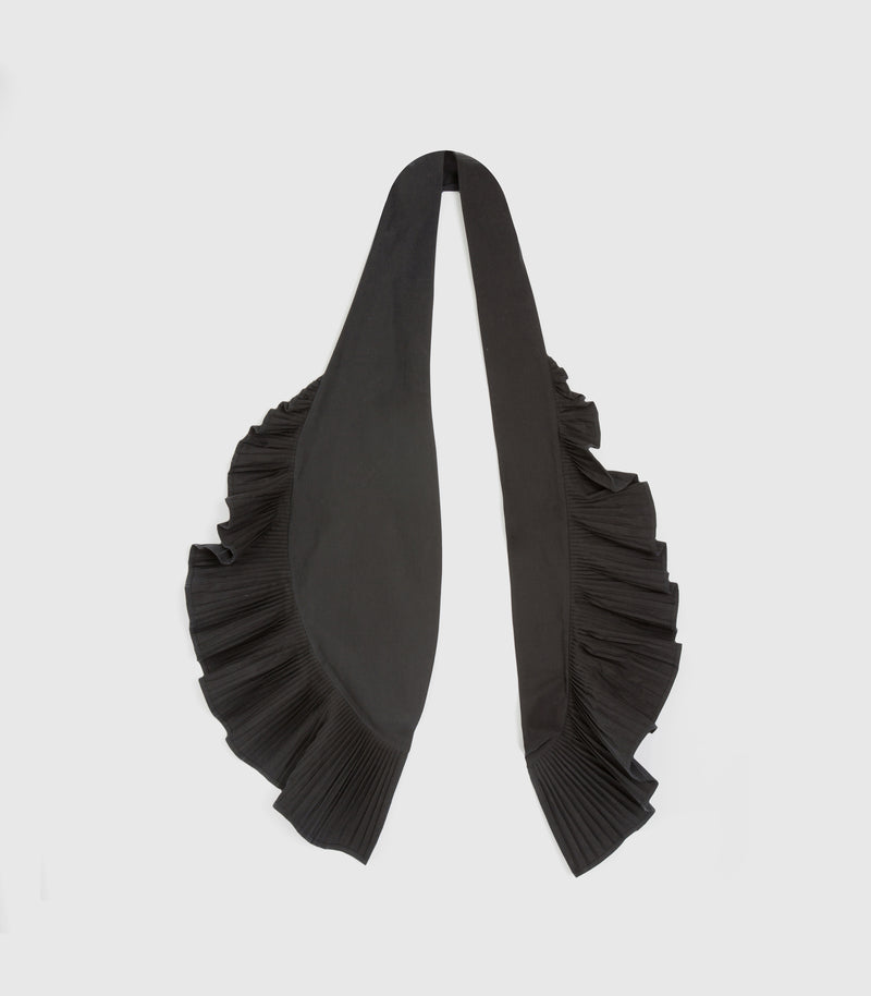 A black scarf with dramatic pleated ruffle trim on both ends, displayed flat against a light gray background.