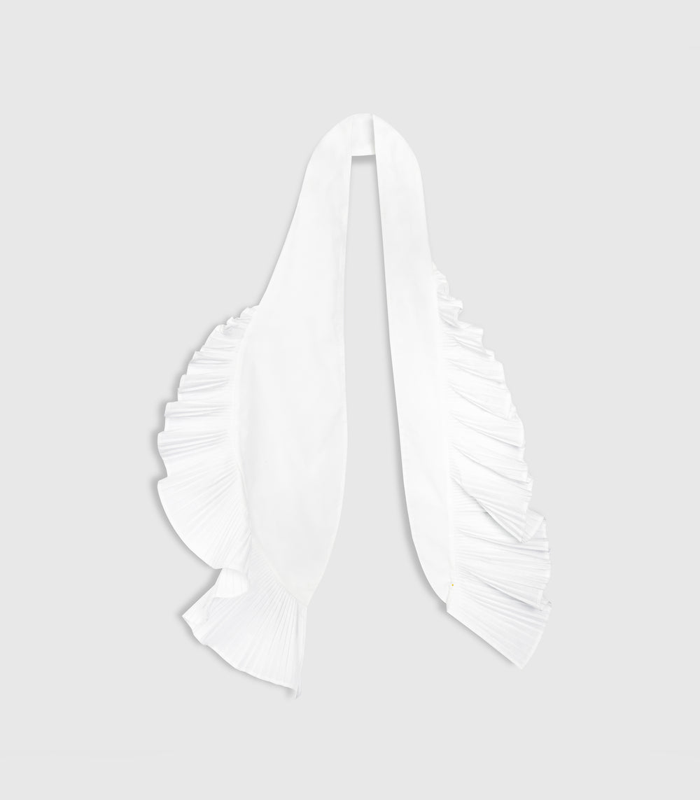 A white pleated scarf with ruffled trim, displayed against a solid light gray background.